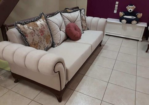 Μαξιλαράτος τριθέσιος καναπές κρεβάτι σε εκρού χρώμα