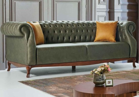 Πολυτελής πράσινος καπιτονέ καναπές