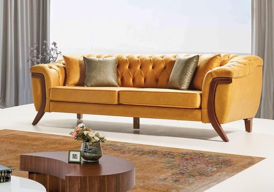 Chesterfield κίτρινος καναπές με λοξό πόδι