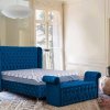 Μπλε καπιτονέ κρεβάτι με στρώμα και ταμπουρέ