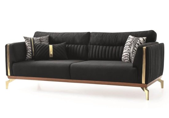 Μαύρος καναπές με χρυσές λεπτομέρειες