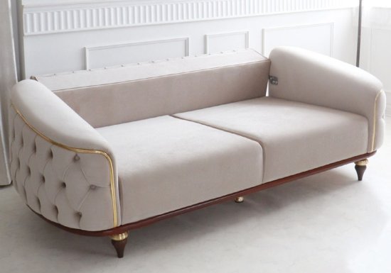 Αριστοκρατικός εκρού καπιτονέ καναπές κρεβάτι
