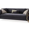 Μαύρος καναπές με χρυσά στοιχεία