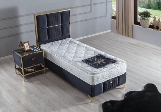 Μαύρο υφασμάτινο κρεβάτι με αποθηκευτικό χώρο και χρυσές λεπτομέρειες