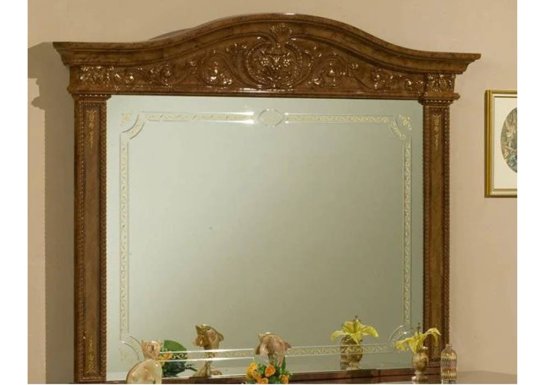 Κλασσικός καμπυλωτός καθρέφτης σε χρώμα καρυδί με διακοσμητικά λουλούδια.